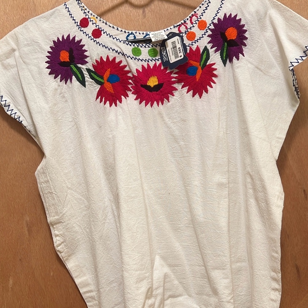 White Blouse with Vibrant Floral Embroidery